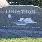 Gray granite double upright headstone monument with polished finish for a shared family memorial.
